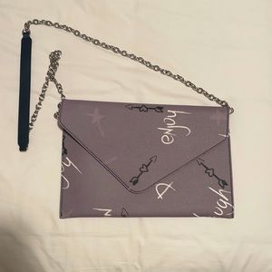 Grey purse from Camila canabal